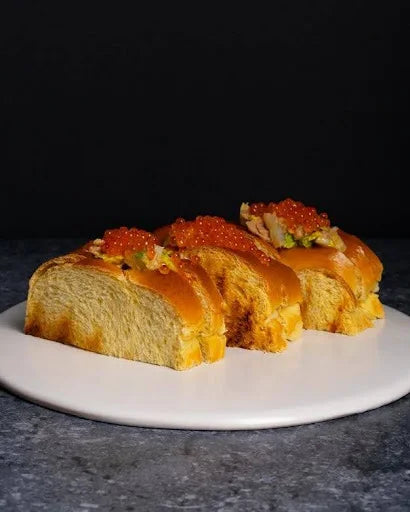 Brioche con huevas de trucha Spherika