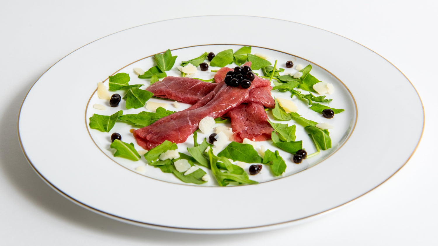 CARPACCIO DE BUEY CON SPHERIKA PERLAS DE VINAGRE BALSÁMICO DE MÓDENA