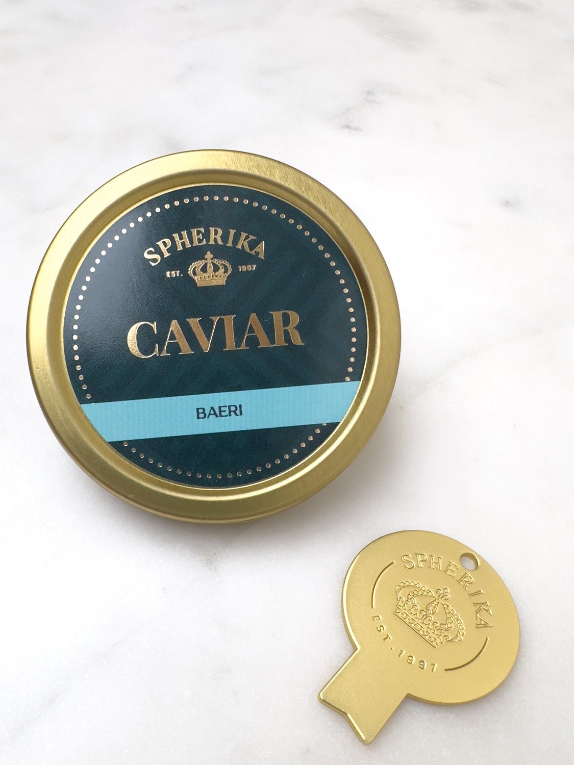 Clé à caviar Spherika, dorée